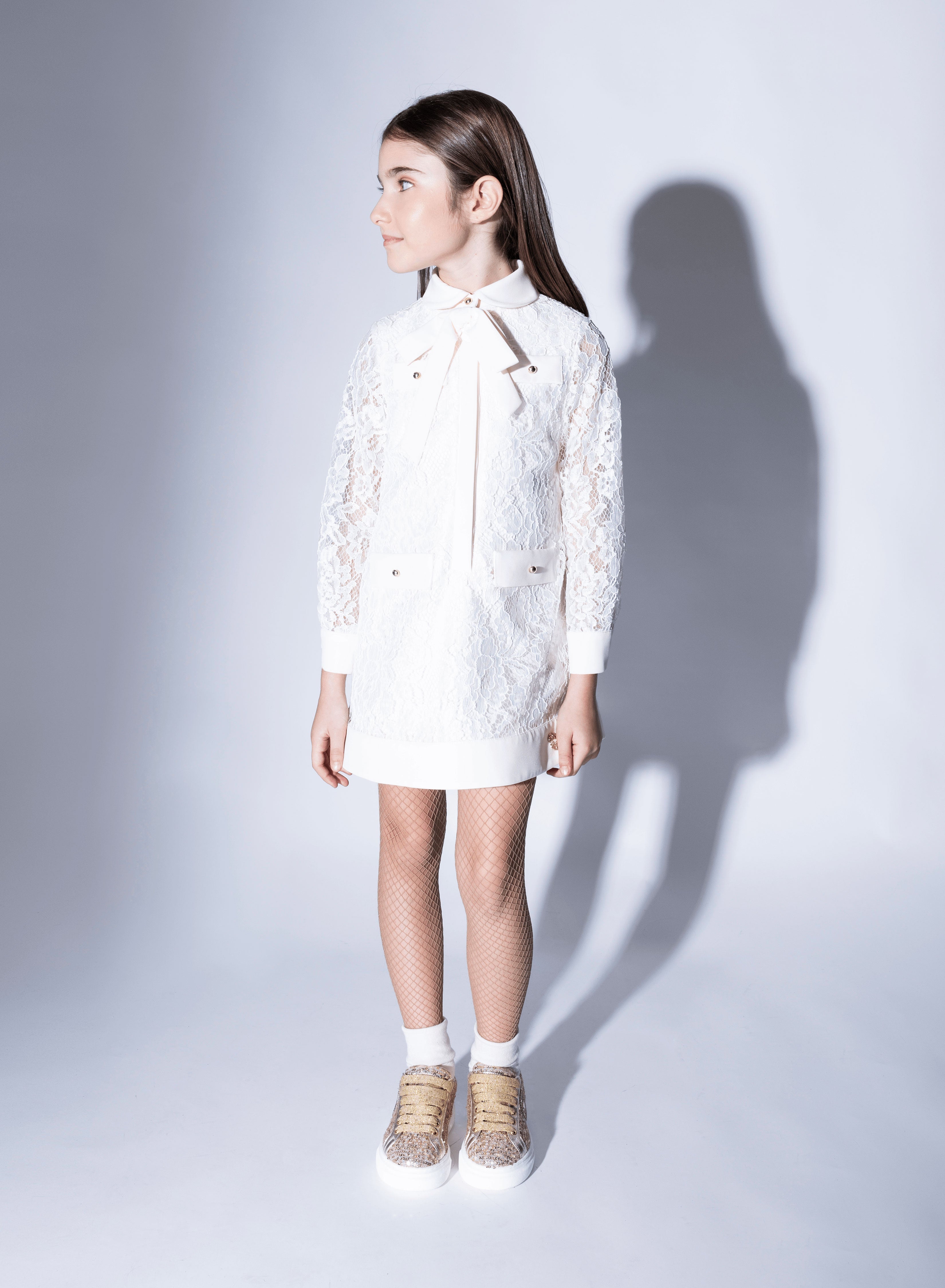 elie saab white mini dress Ruffled bursts of tulle flurry across short bell skirts into long removable trains. Discover the Bridal Fall Winter 2025 collection on www.eliesaab.com #ELIESAAB #ELIESAABBRIDAL